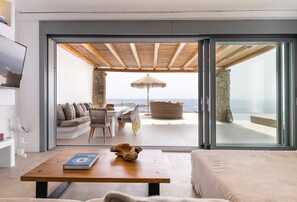 Living area - Superb Seafront Mykonos Villa | Villa Eros | 4 Bedrooms | Panoramic Sea Views |. (Mykonos)