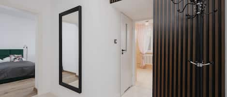 Iron/ironing board, travel crib, WiFi, bed sheets