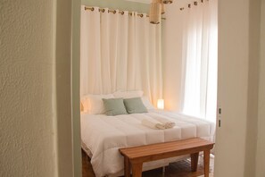 Suite | Minibar, tabla de planchar con plancha, wifi gratis y ropa de cama