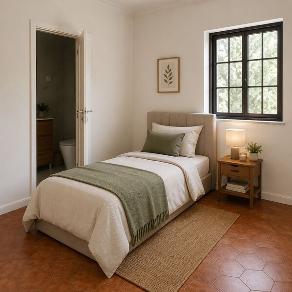 A bedroom with a bed, bedside table, lamp, and a window with a view of trees. - 1-Bedroom Apartment in Amares, Braga (September through June) (Barreiros)
