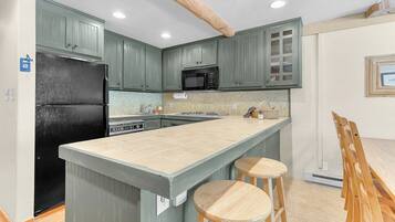 Condo, 2 Bedrooms | Private kitchen | Fridge, oven, coffee/tea maker, toaster