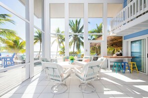 Outdoor dining - Barefoot Kai: Beach House w/Pool, Summer Kitchen, Dock + Kayaks, Steps to Rum Point Club! (Cayman Kai)