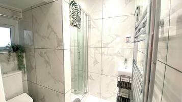 Shower, hair dryer, shampoo