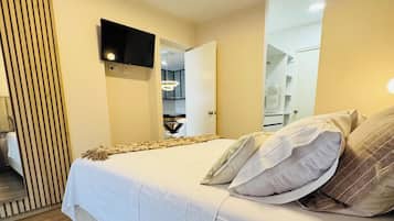 1 quarto, ferros/tábuas de passar roupa, acesso à internet