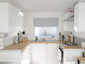 Fridge, microwave, coffee/tea maker, toaster