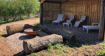 A magical different unique self catered space. Come and enjoy the animals too.