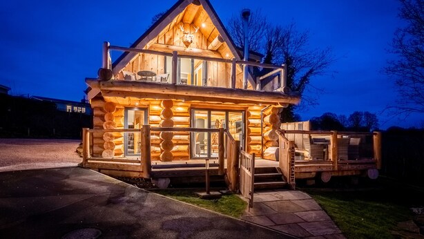 A log cabin with a balcony and a chimney. - Keepers Cabin (Ilkley)