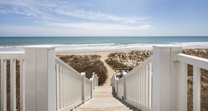 2BR/2BA Colony By The Sea with ocean views, elevator & private balcony. Enjoy a king ensuite & twin guest room with TV's, full kitchen, washer/dryer, community pool, hottub, and direct beach access.