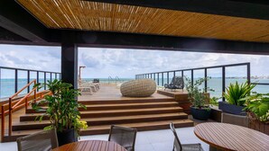 Outdoor dining - Restinga #008 - Beachfront Studio by Carpediem (João Pessoa)