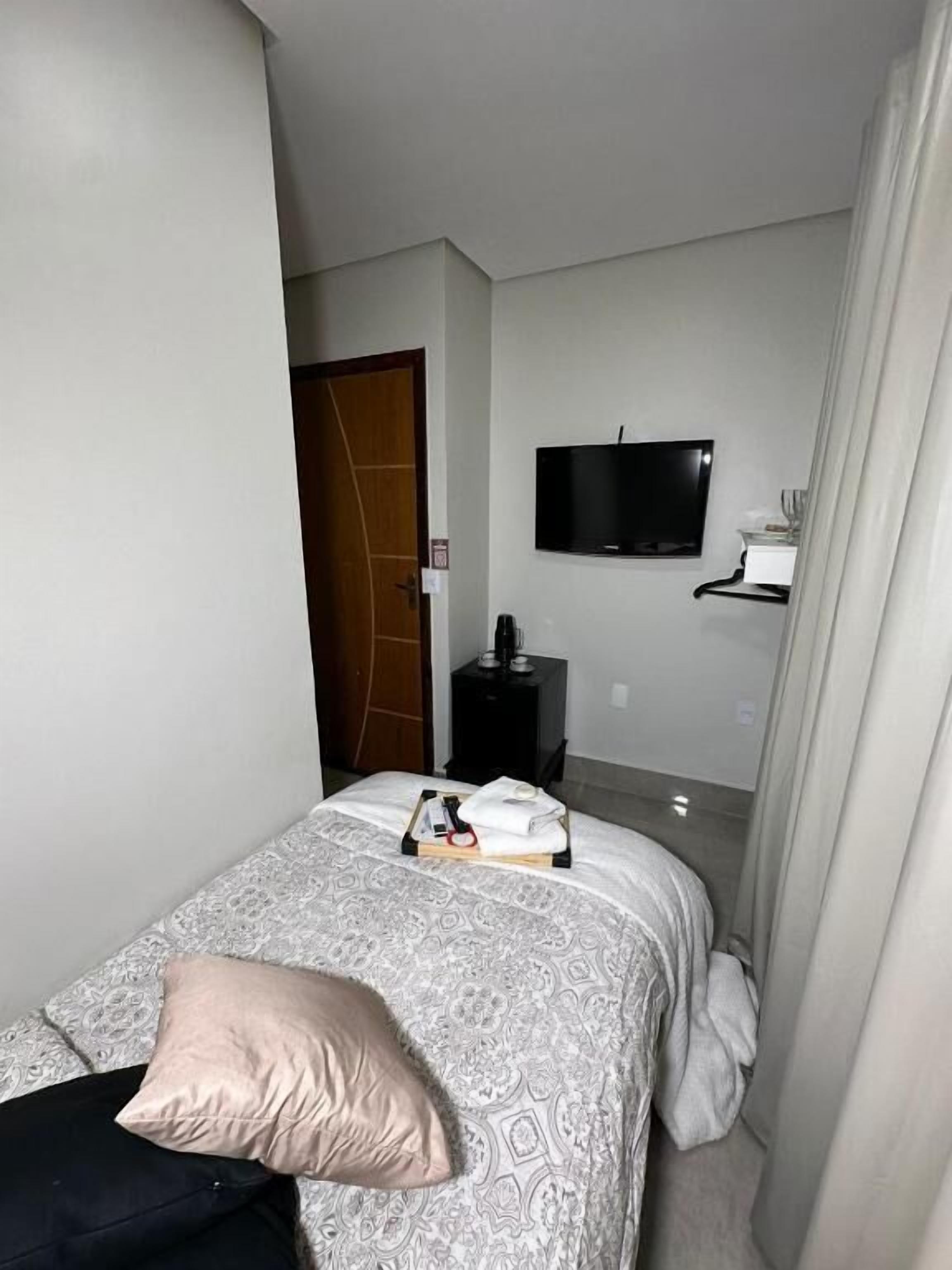 Basic Single Room, City View | Blackout drapes, iron/ironing board, free WiFi, wheelchair access