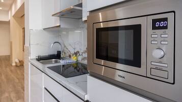 Fridge, microwave, coffee/tea maker, electric kettle