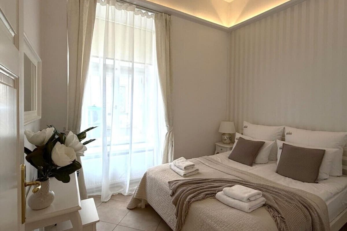 Deluxe Apartment, 2 Bedrooms | Living area | Flat-screen TV