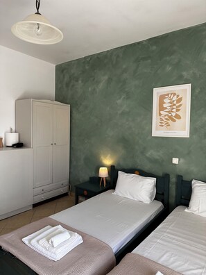 1 dormitorio, tabla de planchar con plancha, wifi gratis y ropa de cama