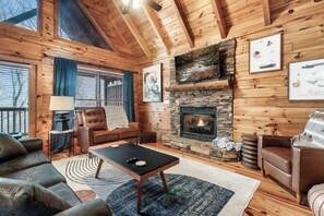 TV, fireplace - *Relaxing  2BD Cabin Near TOWN | Hot Tub + VIEWS* (Pigeon Forge)