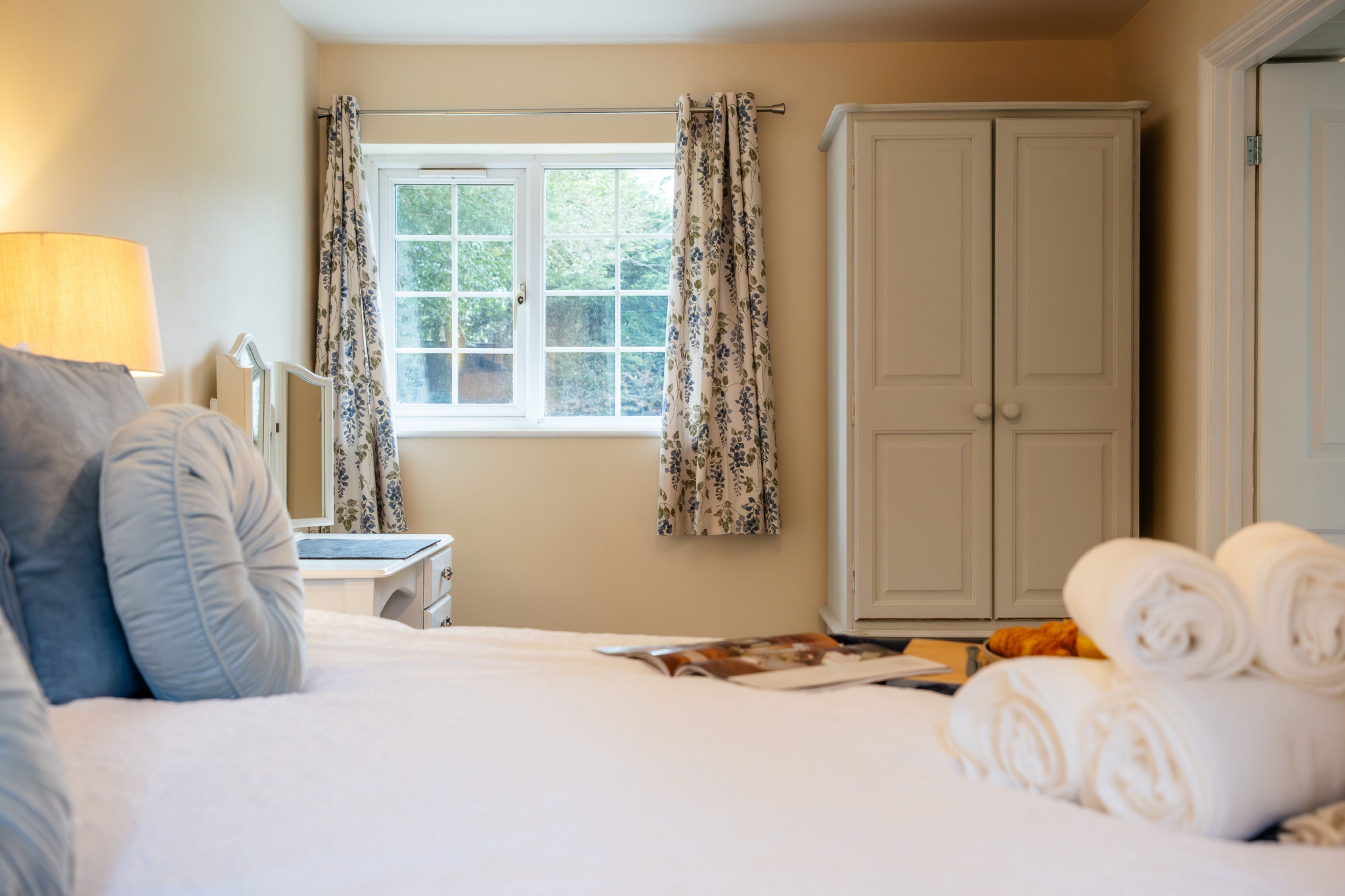 Dual aspect windows in the bedroom flood the room with natural light
