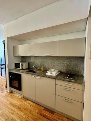 Fridge, microwave, oven, stovetop - Big Palermo 5th floor suite with pool and Sauna (Buenos Aires)