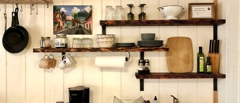 Microwave, stovetop, coffee/tea maker, cookware/dishes/utensils