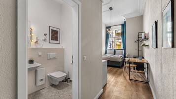 Standard Studio, 1 King Bed | Bathroom | Shower, hair dryer, towels, soap