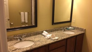 Hair dryer, towels, soap, shampoo