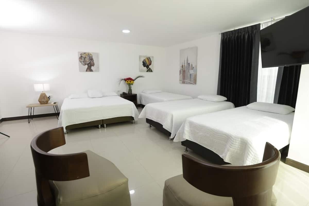 Family Quadruple Room, Sea View | Desk, laptop workspace, soundproofing, free WiFi