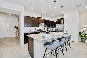 Fridge, microwave, oven, stovetop - Sleeps 11! 5BR Pool Home at Solterra Private Pool Near Disney! Theme rooms! (DAVENPORT)