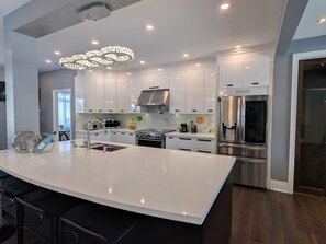 Fridge, microwave, dishwasher, coffee/tea maker