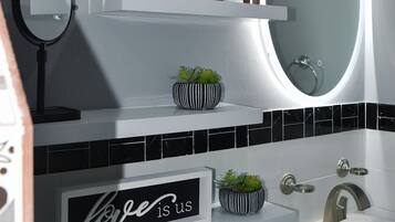 Hair dryer, towels, soap, toilet paper