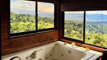 Shower, jetted tub, towels, soap