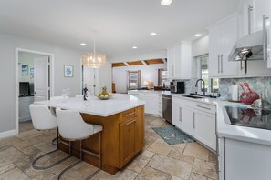 Fridge, microwave, oven, stovetop - Uniquely Beachy and Charmed 3BR | 3 BA with Pool on Canal (Marco Island)