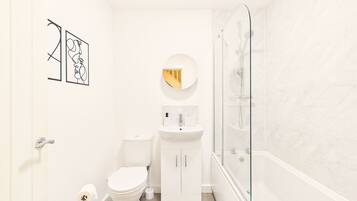 Hair dryer, towels, soap, toilet paper