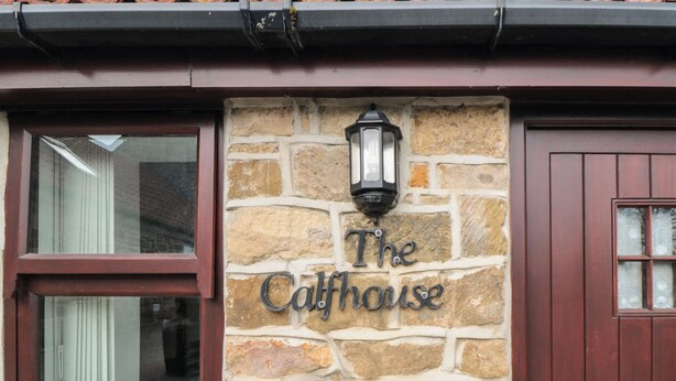 A stone building with a sign reading "The Cathouse." - The Calf House (Saltburn-by-the-Sea)