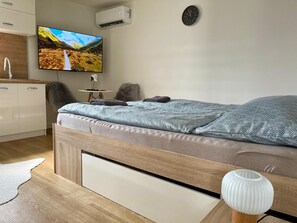 Unclassified image, 4 of 8, button - Cozy studio in tranquil Trenčiansky kraj with AC comfort (Trenčiansky kraj)