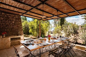 Outdoor dining - Historic Trulli with Panoramic Pool & Sea View (Selva di Fasano)