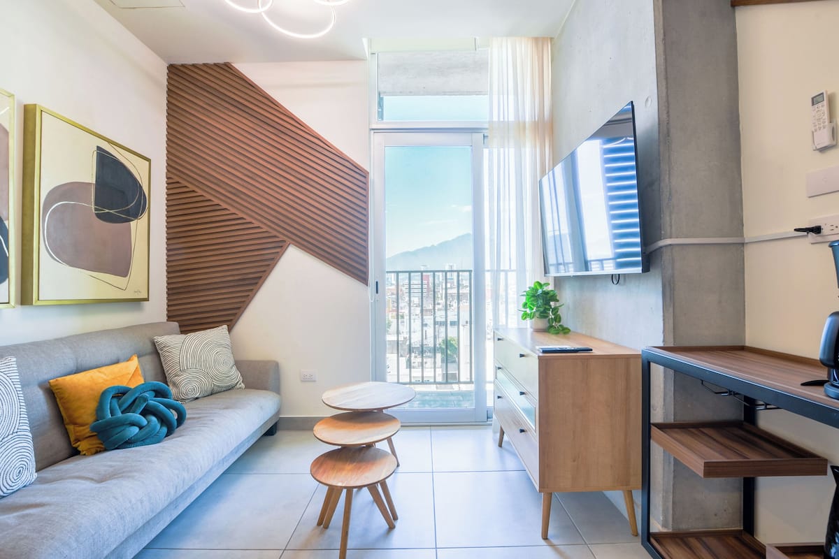 Junior Suite, City View | Living area | Smart TV