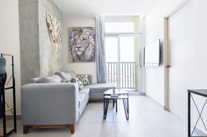 Classic Suite, City View | Living area | Smart TV