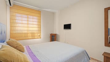 2 dormitorios, tabla de planchar con plancha, wifi y ropa de cama