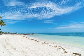 On the beach, beach towels - Private Beach! Ocean View Condo! Heated Pool! Balcony & Luxury Amenities! (Key Colony Beach)