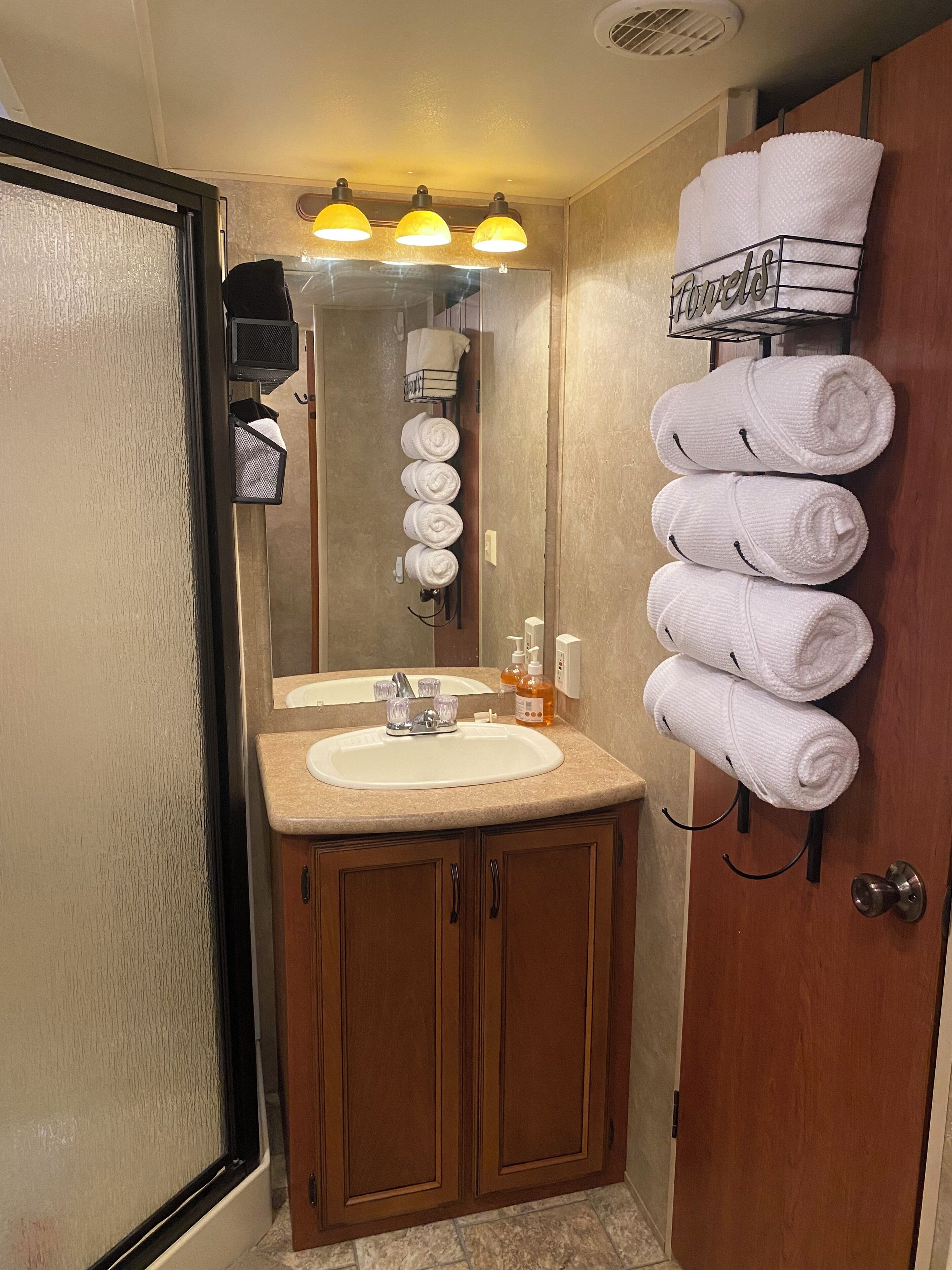 Shower, towels, toilet paper