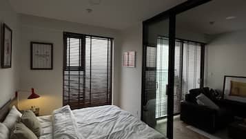 Desk, laptop workspace, blackout curtains, soundproofing