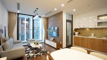 Deluxe Suite, City View | Desk, laptop workspace, blackout drapes, soundproofing