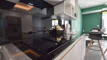 Fridge, microwave, stovetop, coffee/tea maker