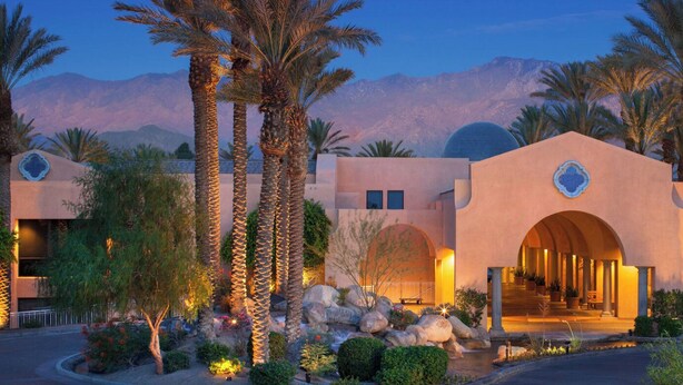 A resort with multiple buildings, palm trees, and a mountainous backdrop. - Westin Mission Hills Resort Villas – 1BR Premium – March 7–14 2026 – Owner Week (Rancho Mirage)
