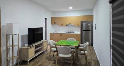 New centrally located apartment with shared balcony.