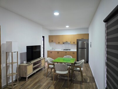 New centrally located apartment with shared balcony.