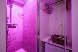 Shower, eco-friendly toiletries, hair dryer, towels