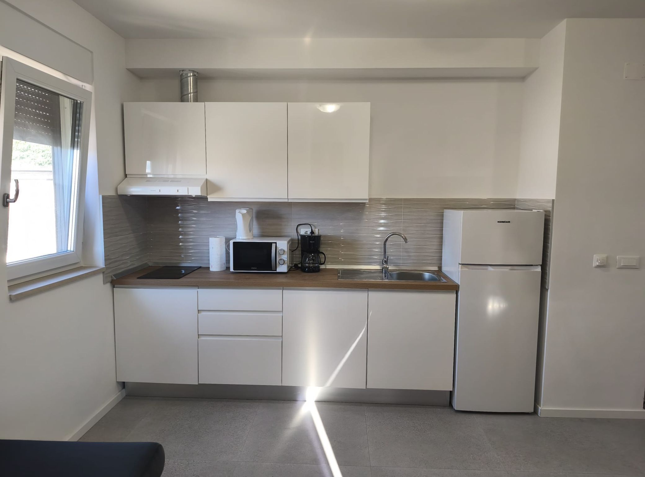 Apartment (Superior One Bedroom Apartment with B) | Private kitchen | Fridge