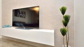 Apartment (Two Bedroom Apartment with Terrace 4) | Living room | 32-inch flat-screen TV with satellite channels