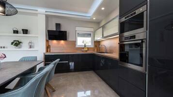 Apartment (Superior Two Bedroom Apartment with T) | Private kitchen | Fridge