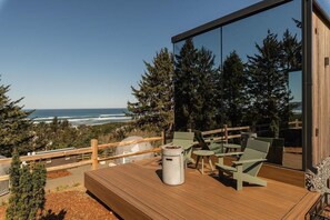 Unclassified image, 4 of 10, button - South Cape Mirror Cabin - Sleeps 2 - Immerse yourself in the surrounding Sitka Spruce forest with a stay in our unique Mirror Cabins. Boasting reflective floor-to-ceiling windows on three sides, these intimate rooms feature expansive viewsno matter t (Cloverdale)