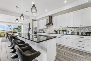 Fridge, microwave, stovetop, dishwasher - Sea Breeze Bliss Vacation Home (Fort Myers Beach)